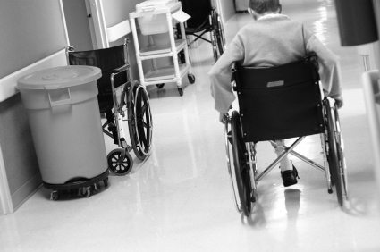 photo of man in wheelchair in nursing home