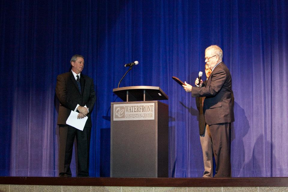 Dennis VanDerGinst being awarded a plaque of appreciation from HAVlife
