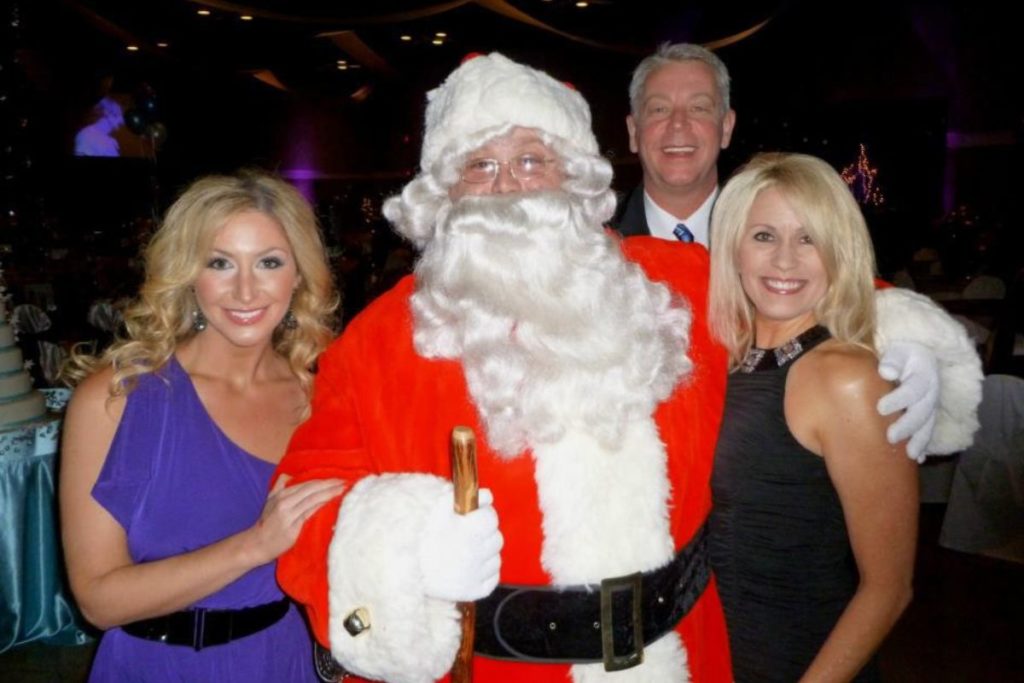 Maggie Hand, Santa, Dennis VanDerGinst and Nancy Swanson