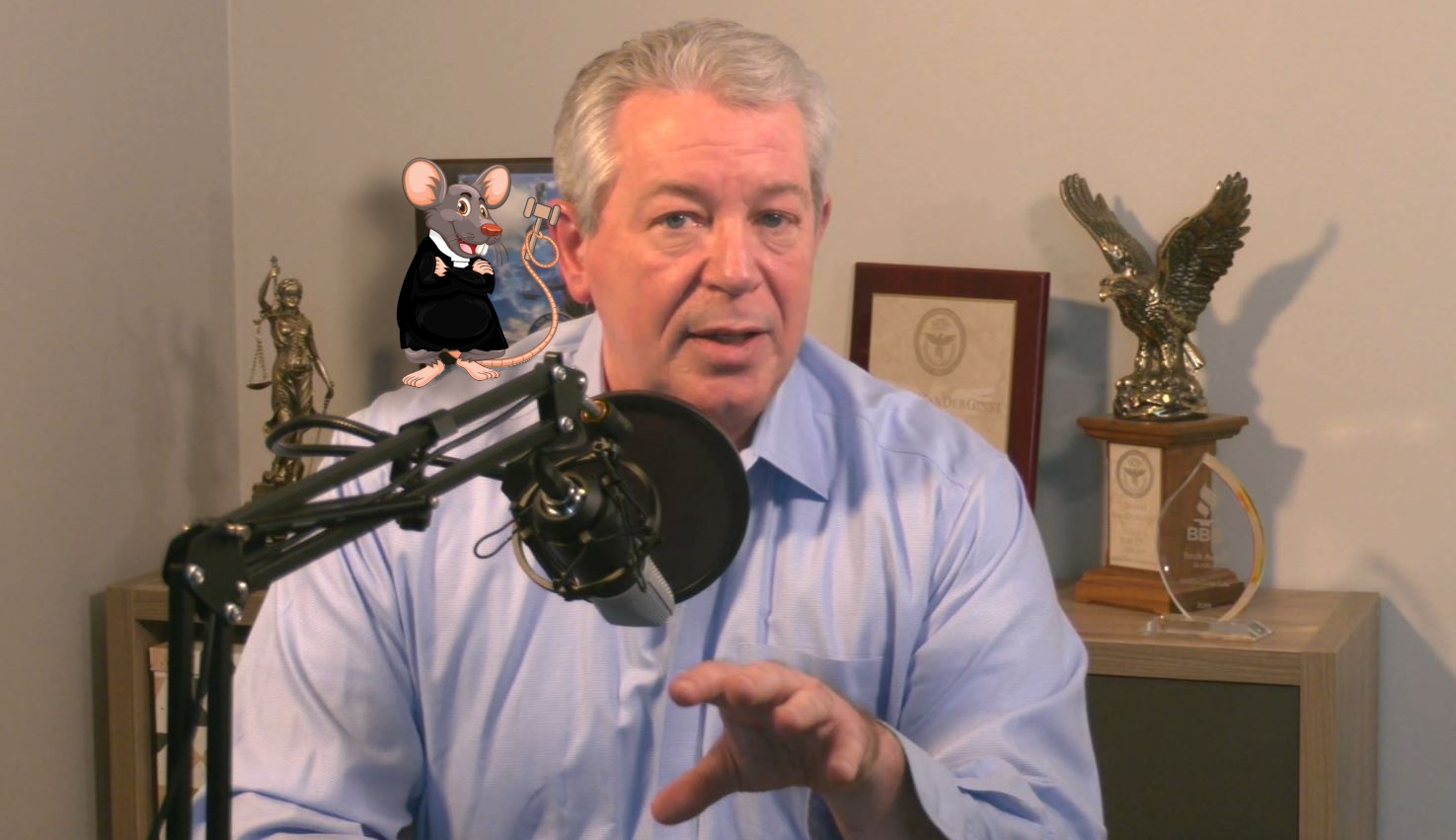 Dennis with Legal Squeaks Mouse Mascot on his Shoulder