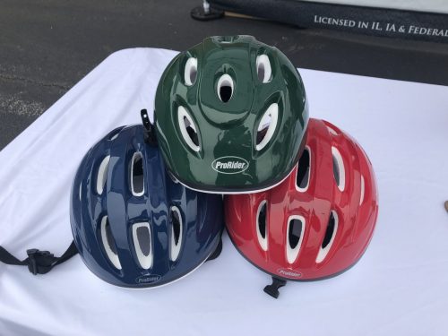 Blue, green, and red helmets